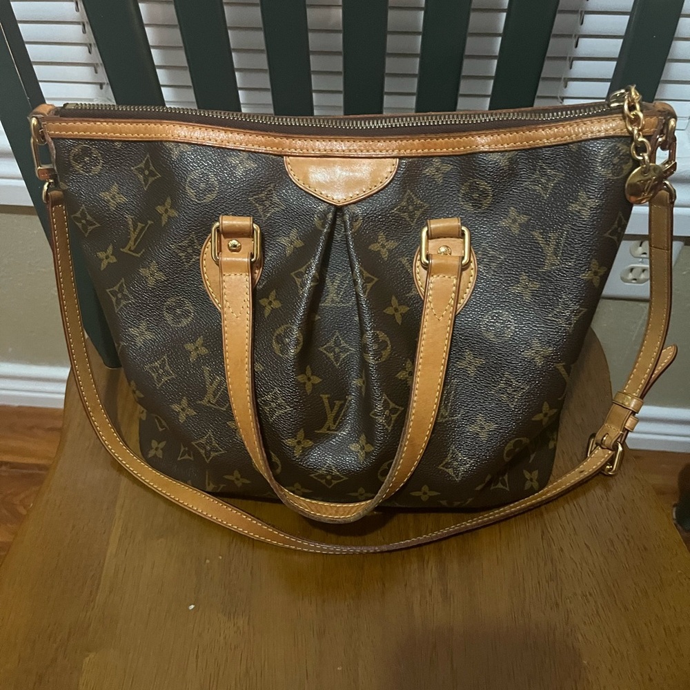 This is a Authentic Louis Vuitton Palermo PM.